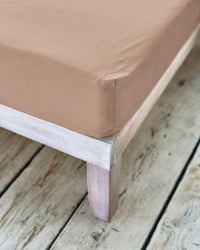 corner of beige fitted sheet