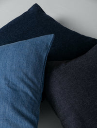 denim scatter cushions in light blue, grey and dark blue. 