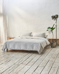 Modern bedroom with exposed brick wall